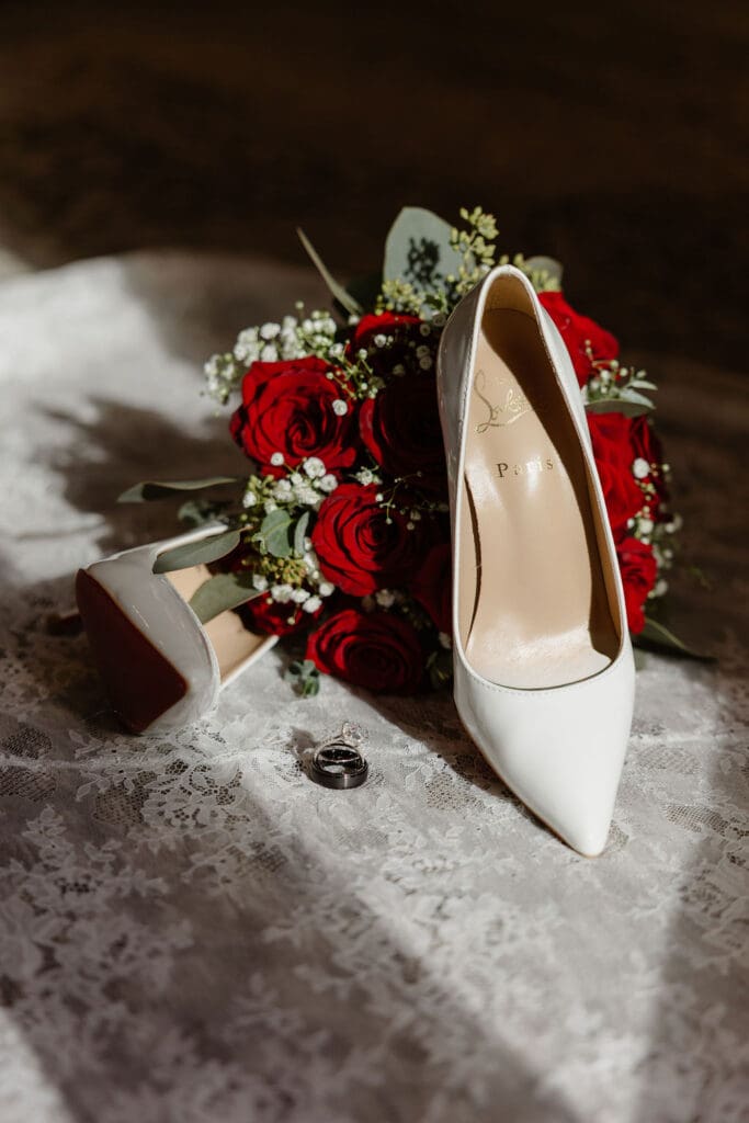 Wedding shoes, ring, and bouquet from wedding details in Fargo North Dakota