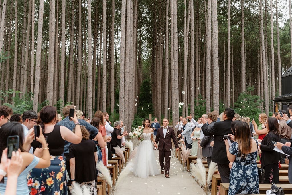 Pinewood wedding ceremony outdoors in Minnesota