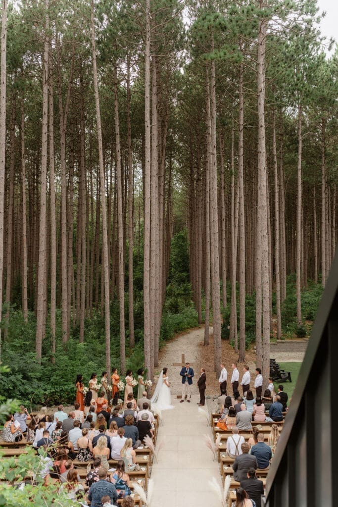 Pinewood wedding ceremony outdoors in Minnesota